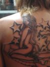 lady with star tattoo on back